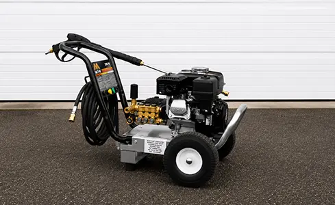 Pressure Washer - Mi-T-M pressure washer on asphalt surface