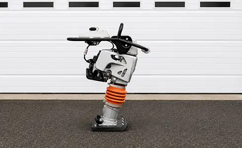 Rammer - Tamping rammer on asphalt surface